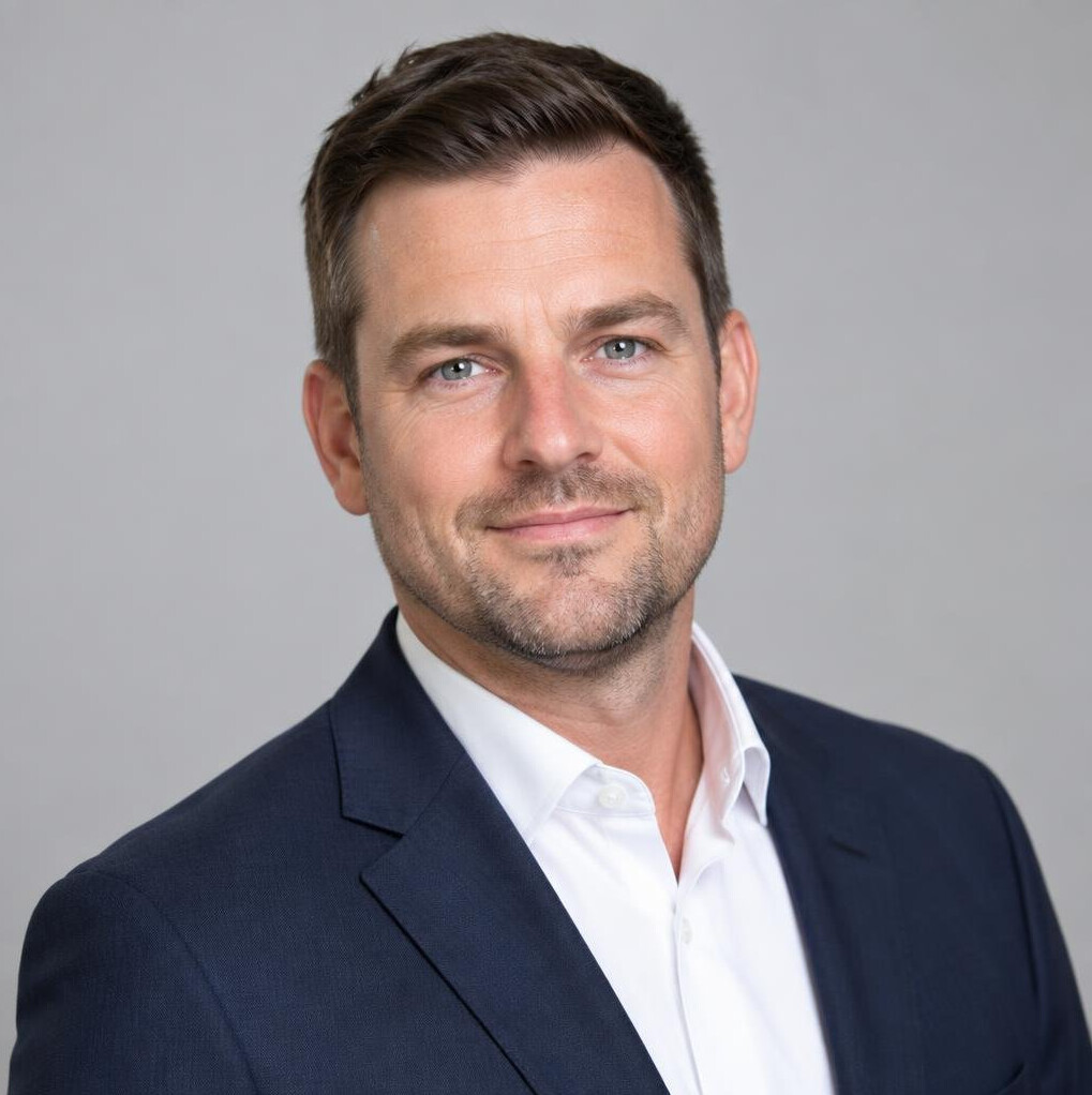 Portrait of a young Belgian businessman in a suit